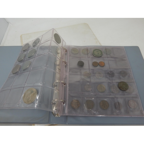 128 - A large collection of coins housed in 4 collectors albums