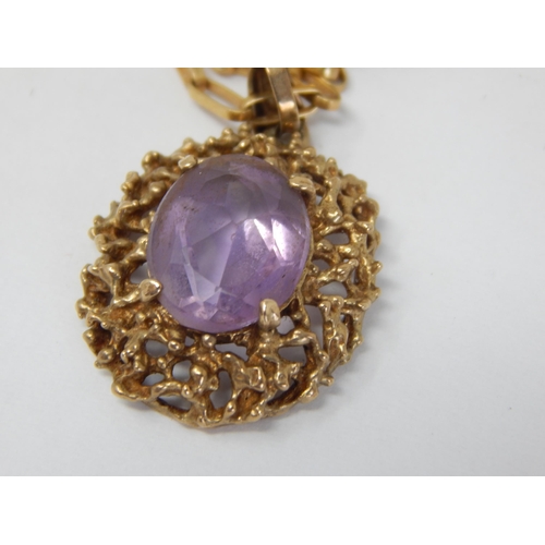 973 - 9ct Yellow Gold Amethyst Pendant on 9ct Yellow Gold Chain: Gross weight 6.6g