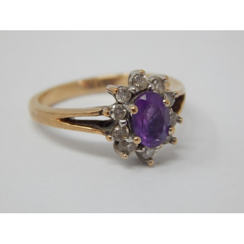 999 - 9ct Yellow Gold Diamond & Amethyst Ring: Size N: Gross weight 3.5g