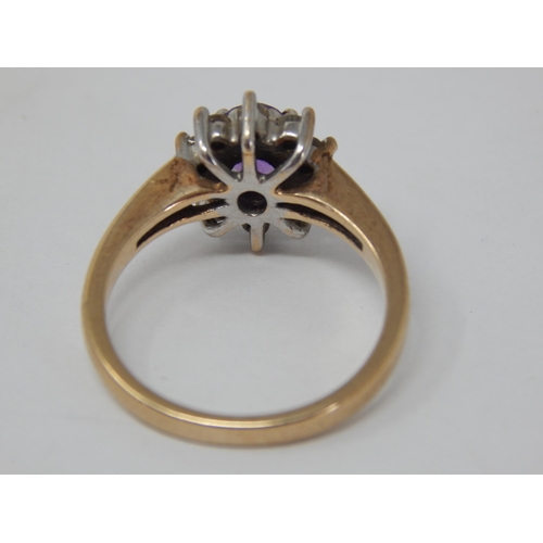 999 - 9ct Yellow Gold Diamond & Amethyst Ring: Size N: Gross weight 3.5g