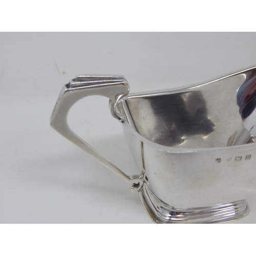 205 - Art Deco Silver Sauce Boat with Angular Stepped Handle: Hallmarked Birmingham 1936 by William Neale:... 