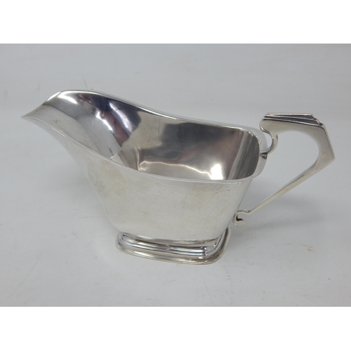 205 - Art Deco Silver Sauce Boat with Angular Stepped Handle: Hallmarked Birmingham 1936 by William Neale:... 