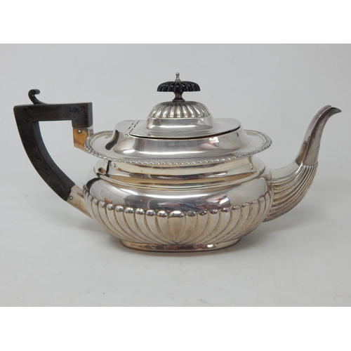 209 - Edwardian Silver Teapot: Hallmarked Birmingham 1910 by William Neale: Gross weight 651g