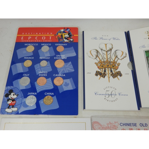 181 - Walt Disney Commemorative Medal 1996, UK Brilliant Uncirculated £2 coin 1997; set of Chinese currenc... 