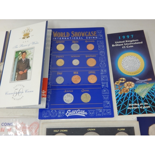 181 - Walt Disney Commemorative Medal 1996, UK Brilliant Uncirculated £2 coin 1997; set of Chinese currenc... 