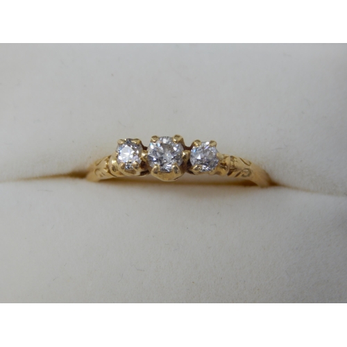 226 - Yellow Gold Diamond Trilogy Ring Set with a Central Brilliant Round Cut Diamond Measuring 3.4mm & Fl... 