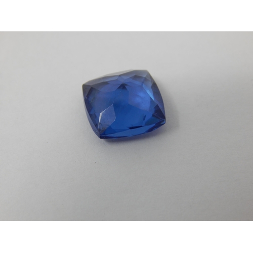 402 - A 10.37ct Cushion Cut Tanzanite with G.I.L Certificate of Authenticity.