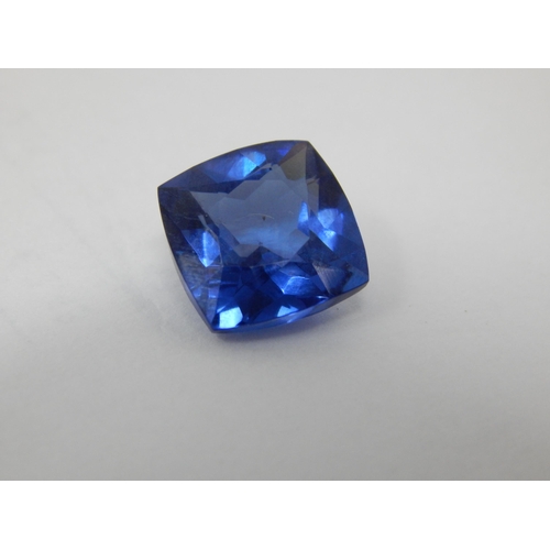 404 - A 10.67ct Cushion Cut Tanzanite with G.I.L Certificate of Authenticity.