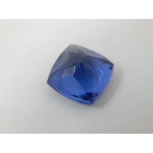 404 - A 10.67ct Cushion Cut Tanzanite with G.I.L Certificate of Authenticity.