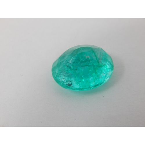 416 - A 10.96ct Oval Cut Emerald with G.I.L Certificate of Authenticity.