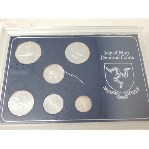 63 - Isle of Man Decimal coin set 1976 struck in Sterling Silver; Isle of Man Silver Proof Crown 1979; Is... 