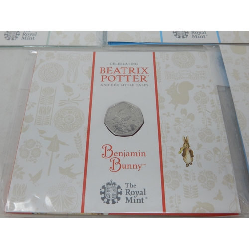 22 - Collection of 7 x Beatrix Potter 50p Coins all brilliant, about as struck and sealed in Royal Mint b... 