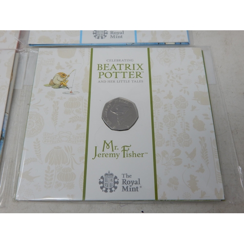 22 - Collection of 7 x Beatrix Potter 50p Coins all brilliant, about as struck and sealed in Royal Mint b... 