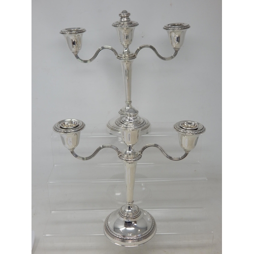 269 - Pair of Elizabeth II silver two branch candelabra, Birmingham 1953/57 by Adie Brothers