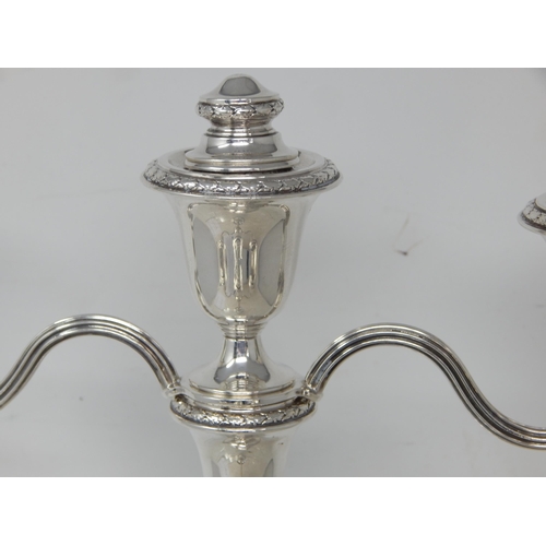 269 - Pair of Elizabeth II silver two branch candelabra, Birmingham 1953/57 by Adie Brothers