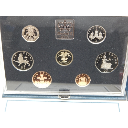 49 - UK Proof sets 1983(2), 1984, 1985, 1993 including £5 coin all housed in Royal Mint cases of issue wi... 