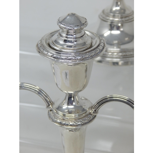 269 - Pair of Elizabeth II silver two branch candelabra, Birmingham 1953/57 by Adie Brothers