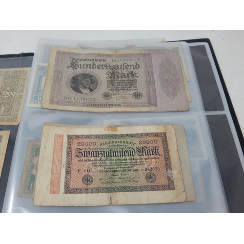 121 - A collection of early banknotes of the World housed in collectors album