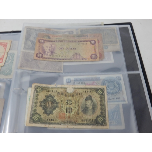 121 - A collection of early banknotes of the World housed in collectors album