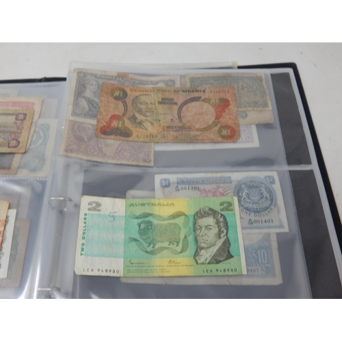 121 - A collection of early banknotes of the World housed in collectors album