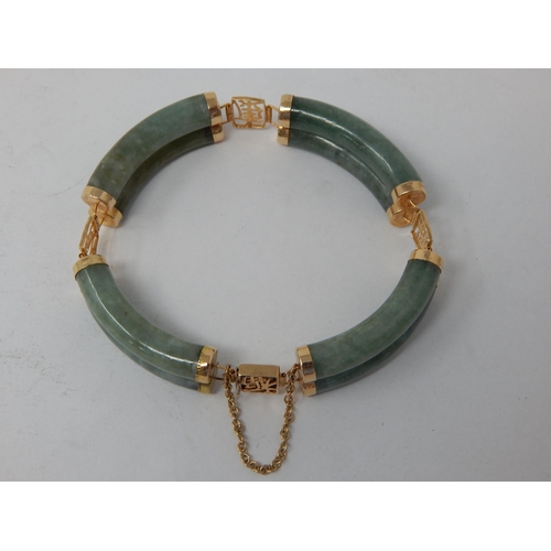 143 - Important Chinese Jade and 14ct Gold bangle