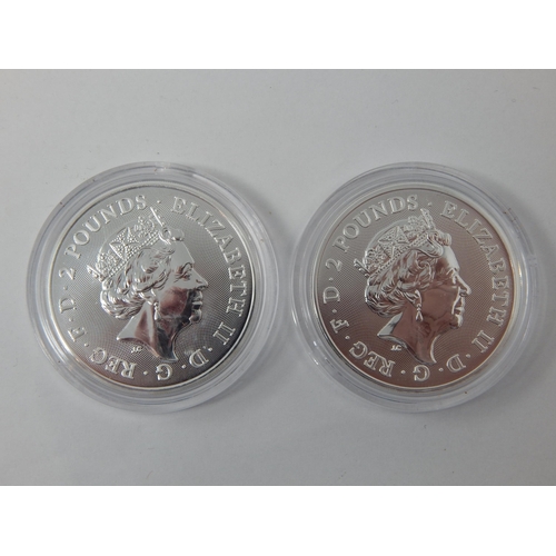 127 - Music Legends Elton John and David Bowie Silver 1 Ounce Commemorative coins, both brilliant, about a... 