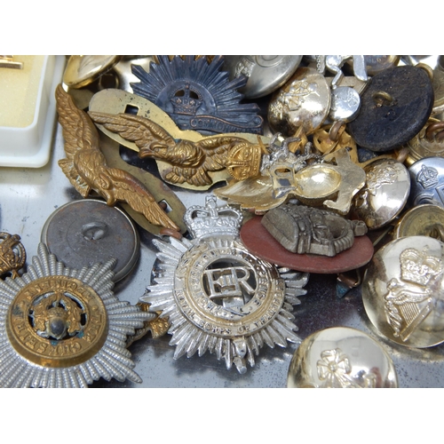 103 - A tin containing a large collection of RAF Cloth badges Military Buttons, etc (lot)