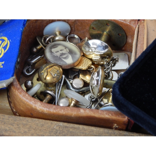 104 - A large box containing a selection of Aircraft cufflinks; Military buttons; large selection of Lodge... 