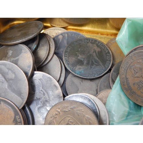 107 - A Jack Daniels tin containing a 1797 George III Cartwheel Twopence and Penny; together with a large ... 