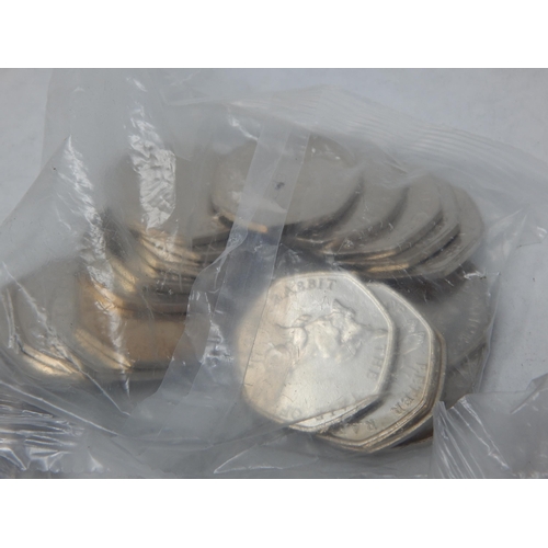 35 - Paddington at the Station sealed bag of 20 x 50p coins; Paddington at the Palace sealed bag of 20 x ... 