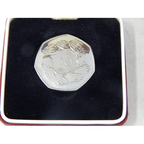 113 - London 2021 Half Dollar Fine Silver Ingot; Nations Touch 2009 Silver Proof £5 coin; Stephen Hawking ... 