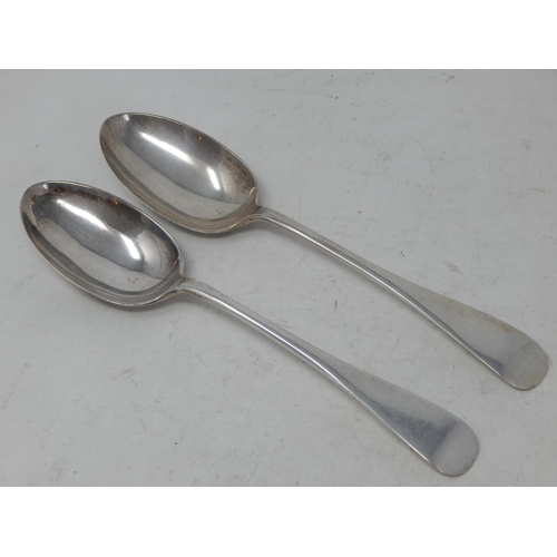 63 - Pair of Silver Serving Spoons: Hallmarked Sheffield 1930/31 by John Rose: Length 21.5cm: Weight 142g