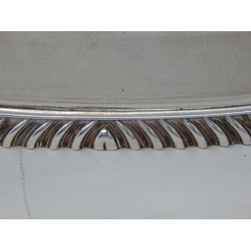 118 - Sterling Silver Oval Serving Tray with gadrooned rim & shell & leaf decoration: Measuring 44cm x 29.... 