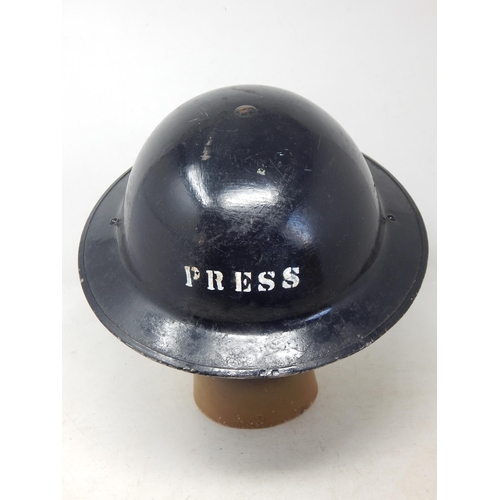 284 - WW2 British black painted helmet marked ‘PRESS’