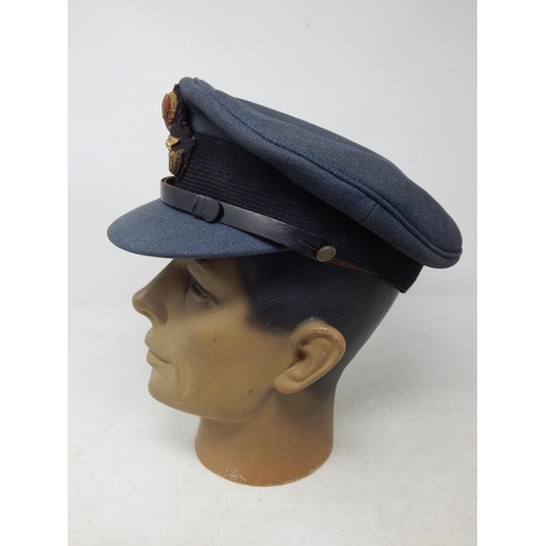 285 - RAF Officer’s peaked cap with King’s Crown insignia