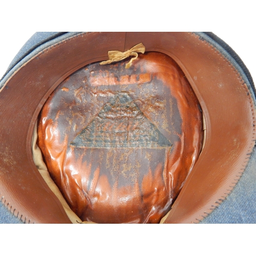 285 - RAF Officer’s peaked cap with King’s Crown insignia