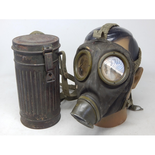 286 - WW2 German gasmask case with gas mask and straps (no filter). Spring closure strap unattached but pr... 