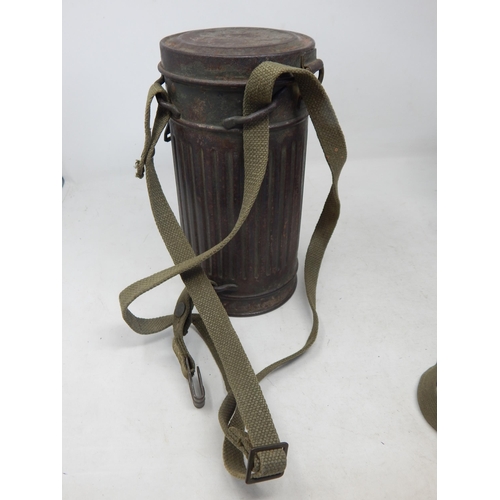 286 - WW2 German gasmask case with gas mask and straps (no filter). Spring closure strap unattached but pr... 