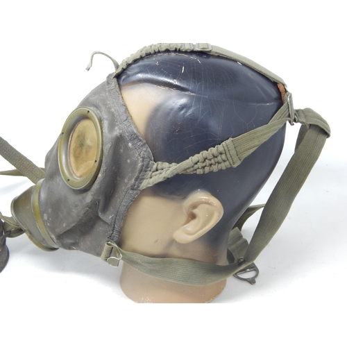 286 - WW2 German gasmask case with gas mask and straps (no filter). Spring closure strap unattached but pr... 