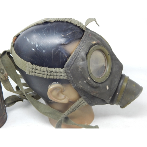 286 - WW2 German gasmask case with gas mask and straps (no filter). Spring closure strap unattached but pr... 