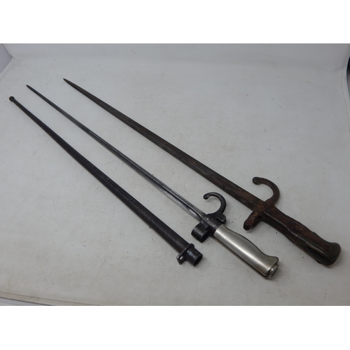 2 x French bayonets one Lebel cruciform bayonet with scabbard recovered from Verdun in the 1960’s, the other an 1874 Gras bayonet with some wood loss to the grip, missing scabbard