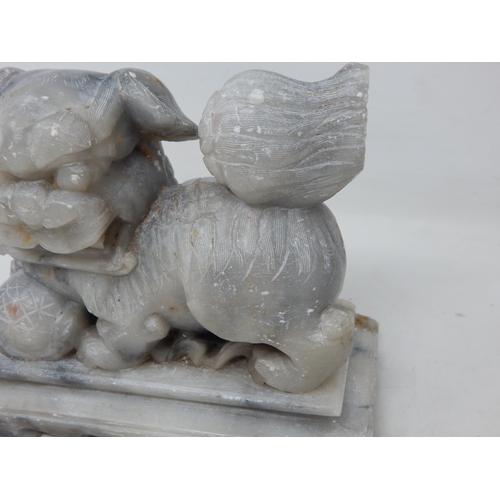 296 - Large Chinese Soapstone Figure of a Temple Dog: Measuring 17.5cm wide x 15cm high