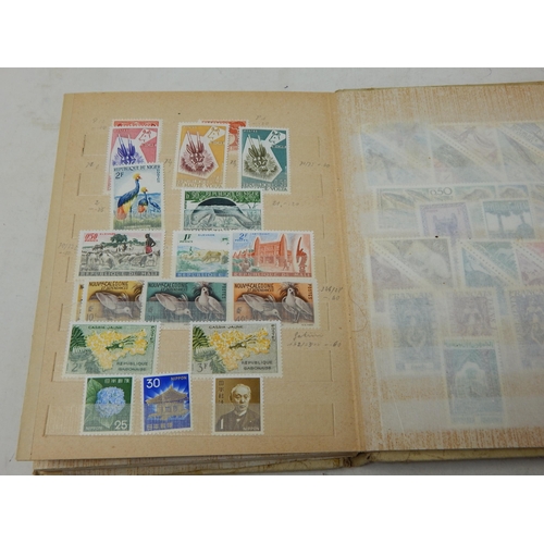 311 - A large collection of Mint Stamps housed in vintage album including Bolivia, Uruguay, Argentina, Cam... 