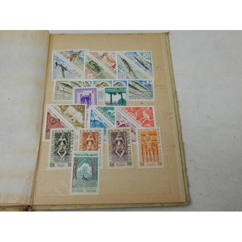 311 - A large collection of Mint Stamps housed in vintage album including Bolivia, Uruguay, Argentina, Cam... 