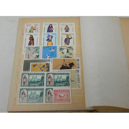 311 - A large collection of Mint Stamps housed in vintage album including Bolivia, Uruguay, Argentina, Cam... 