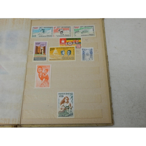 311 - A large collection of Mint Stamps housed in vintage album including Bolivia, Uruguay, Argentina, Cam... 