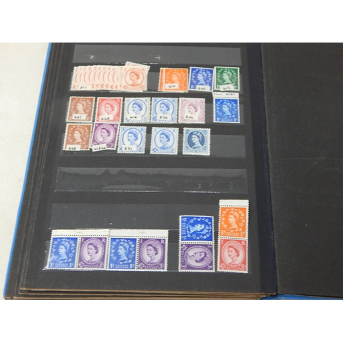 312 - A partially filled stock book containing a useful selection of KGV, KGVI and QEII Mint stamps, some ... 