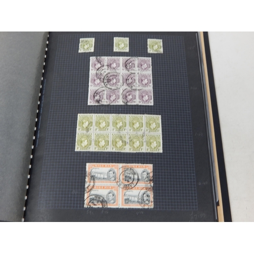 315 - Album containing a large selection of Nigeria stamps, some Mint in blocks, etc