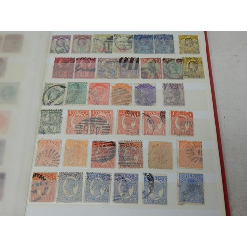 319 - A small red Stockbook containing a useful range of QV from 1d Reds, 5s rose, 2d blue, Australia, GB ... 