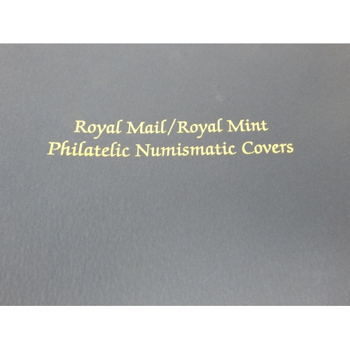 754 - Royal Mail/Royal Mint Philatelic Numismatic Covers album with inserts.